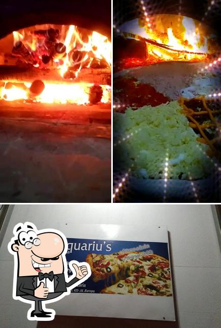 Look at the photo of Aquariu's Pizzaria