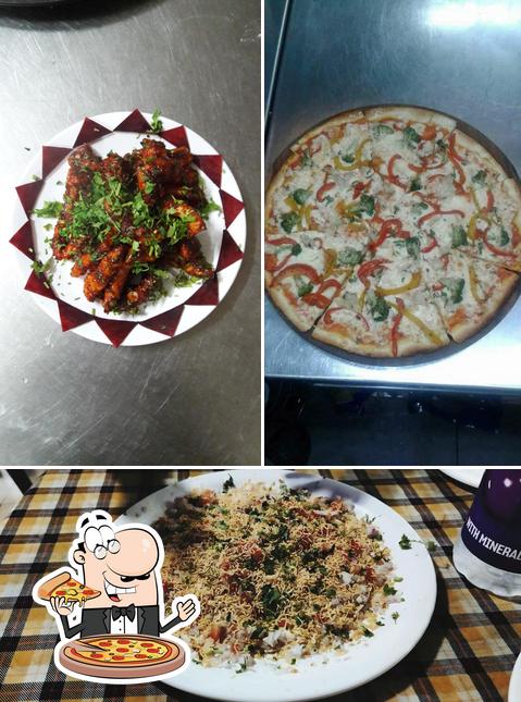 Pick pizza at Mudra - Sprinkle of Love by Bawarchi Restaurant and bar