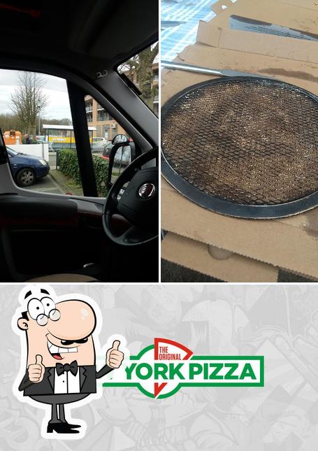 Взгляните на фотографию пиццерии "New York Pizza"