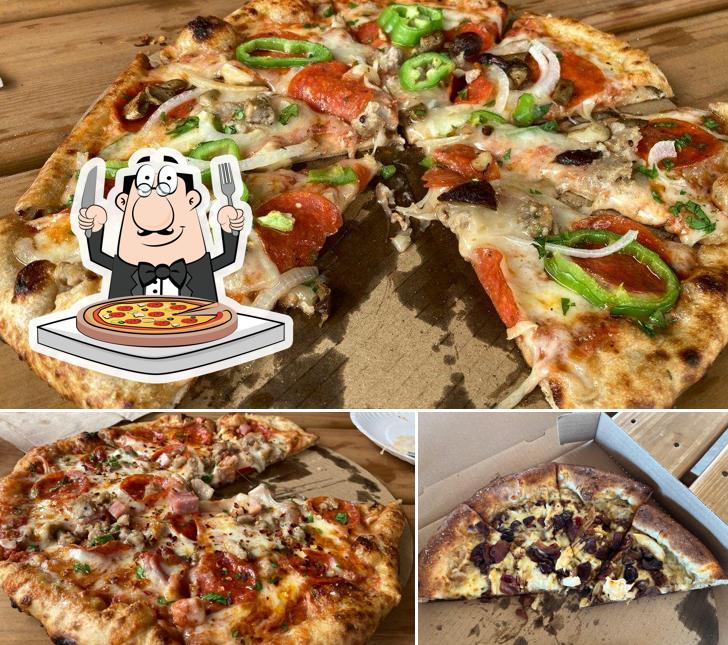 Try out pizza at Locals Food Hub & Pizza Pub