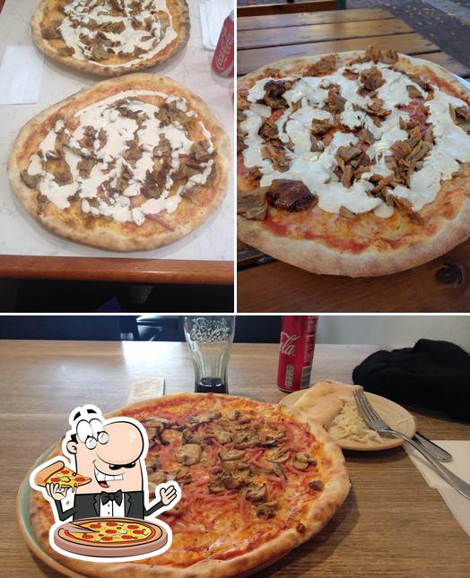 Get pizza at Pizzeria Hawaii Bolos Youssef