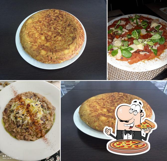 Попробуйте пиццу в "Gastrobar Gallarvi"