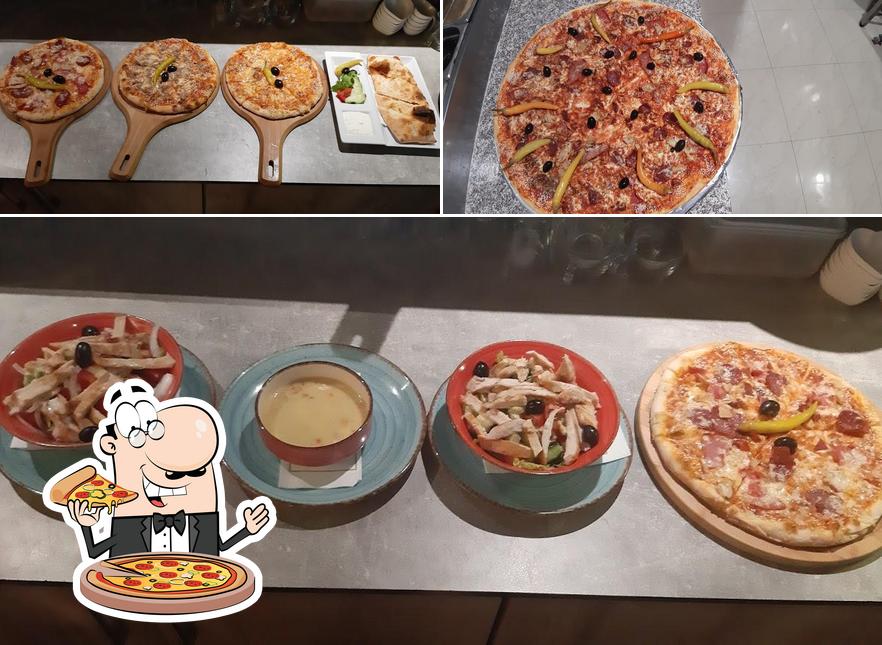 Pick pizza at Sueno Restaurant