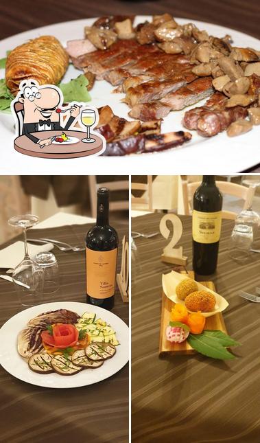 This is the image depicting food and wine at Ristorante Symposio Terme di Orte