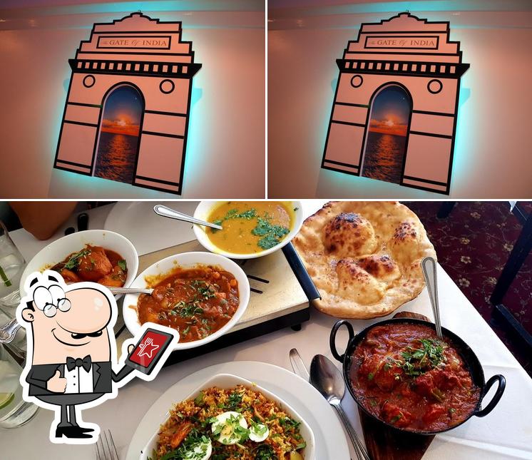 This is the picture depicting exterior and pizza at The Gate Of India, Indian Restaurant, Poole