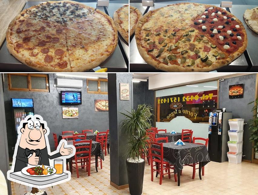 Dai un’occhiata alla foto che presenta la cibo e interni di Parco Pizza Pradamano