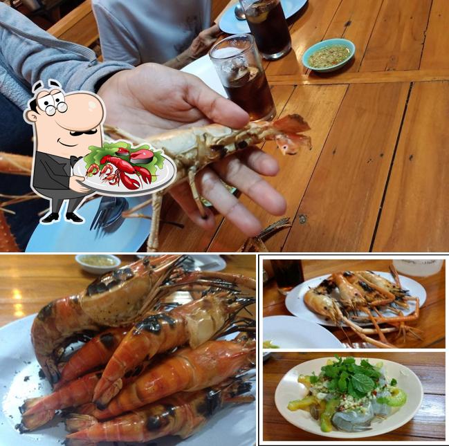 Get various seafood meals served at ก.กุ้งเผา