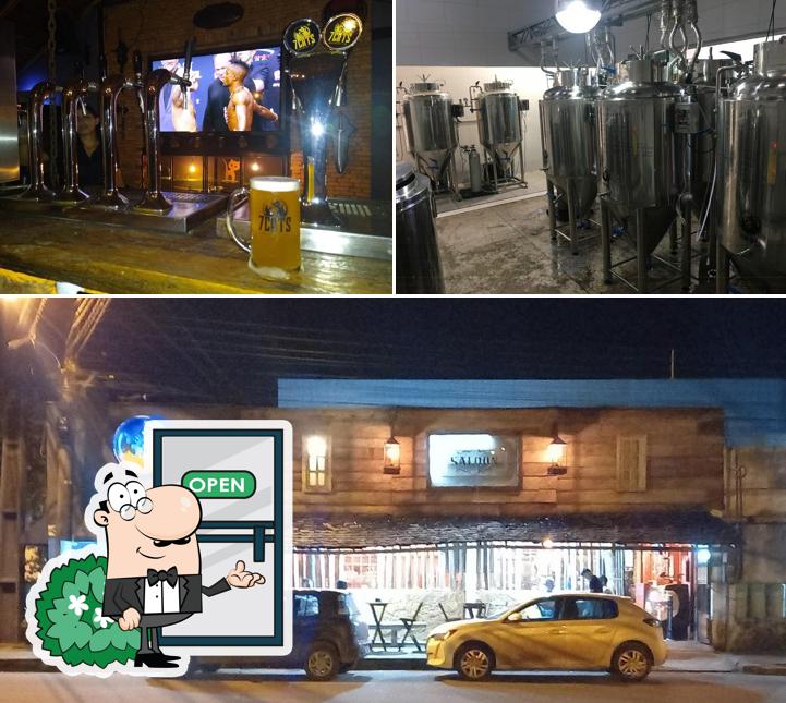 A foto do 7Cats Saloon’s exterior e cerveja