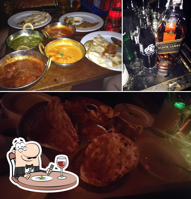 The photo of Bombay Blues’s food and beer