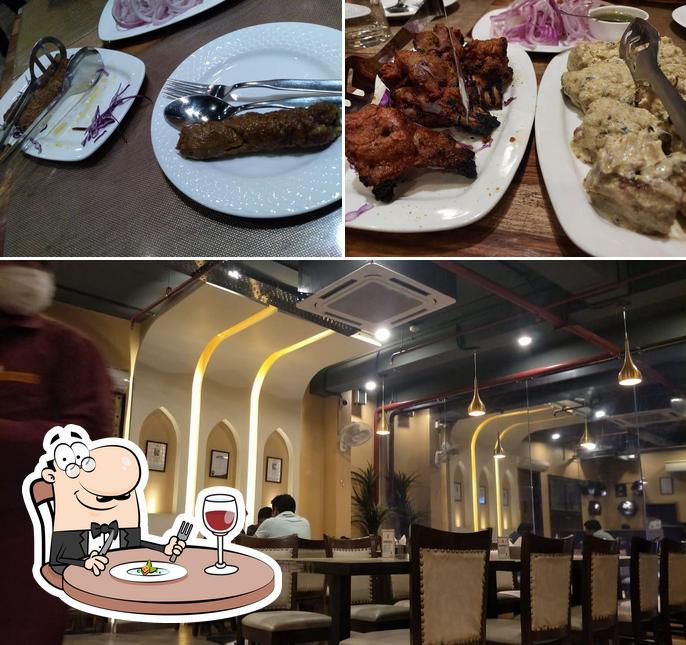 Take a look at the photo showing food and interior at Karim's Restaurant