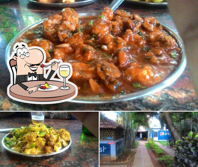 Take a look at the image displaying food and exterior at Abhinandana Family Dhaba