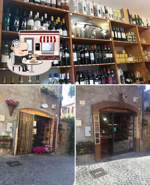 The photo of exterior and wine at Il Negozietto