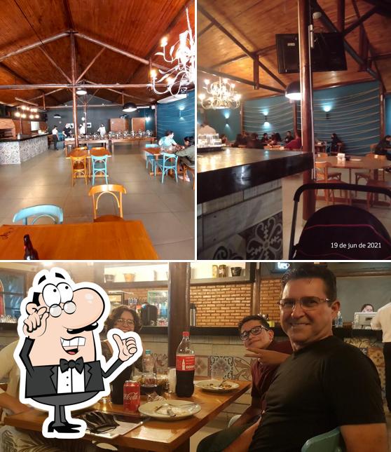 O interior do Pizzaria Curitibana