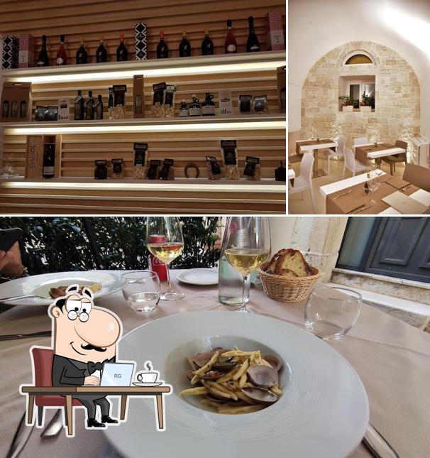 This is the image showing interior and food at Ristorante Locanda San Nicola