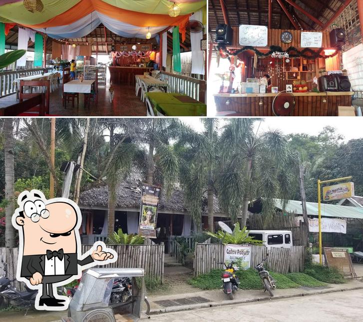 This is the photo depicting interior and exterior at NIPA HUT GRILL HAUZ