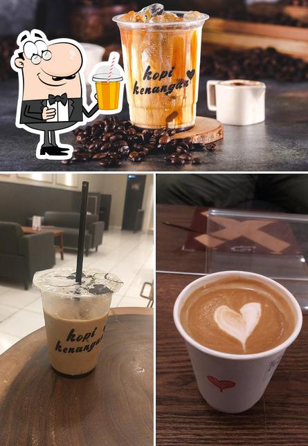 Enjoy a beverage at Kopi Kenangan - Ruko Margonda