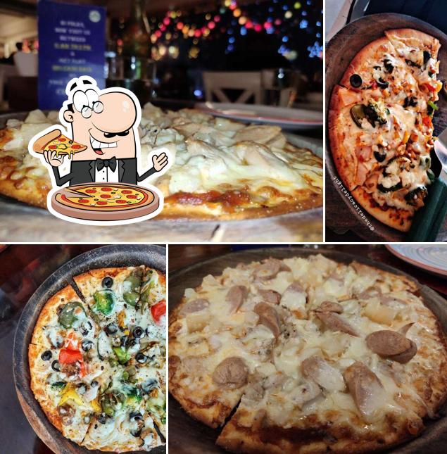 Try out pizza at Roma's Cafe Diner