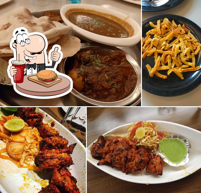 Get a burger at Meghdoot Restaurant