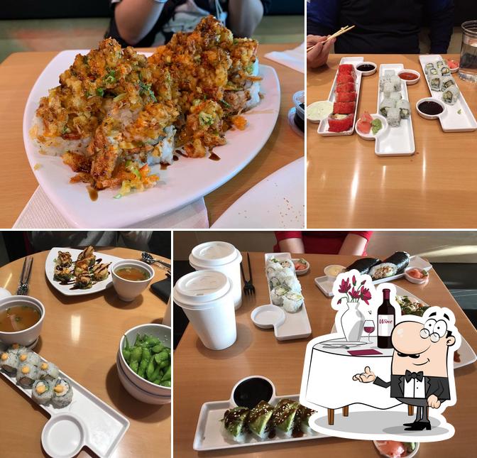 This is the image depicting dining table and food at SushiFork of Tulsa