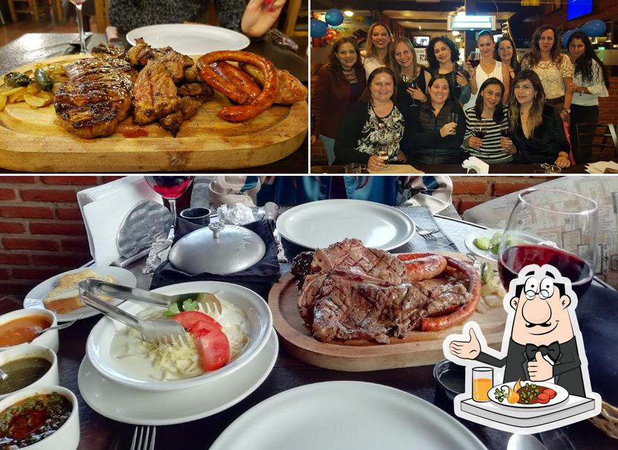 Estas son las fotos que muestran comida y barra de bar en Vía Buenos Aires