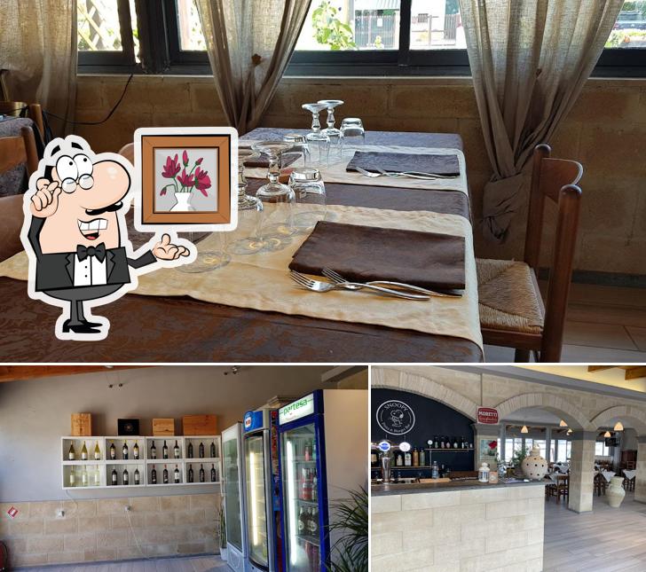 Installez-vous à l'une des tables de Snoopy Ristorante pizzeria Tarquinia Lido
