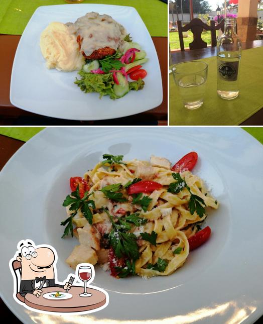 Observa las imágenes que muestran comida y vino en Restaurante Kuparipannu