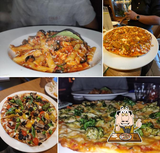 Try out pizza at Woodside Inn - Bandra