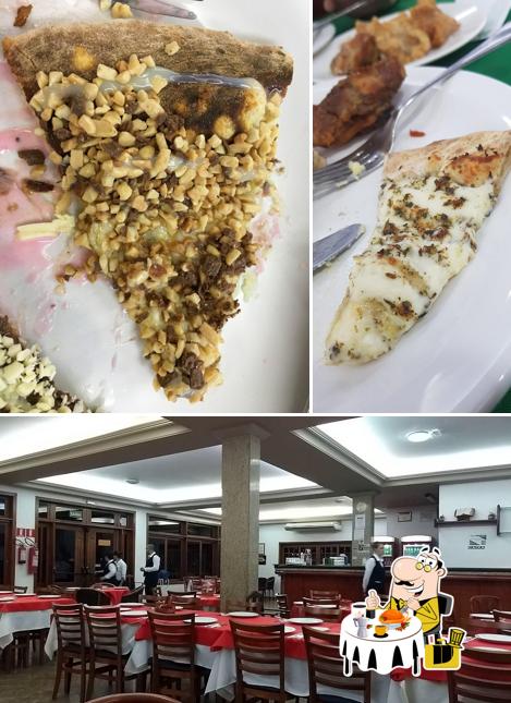 Dê uma olhada a foto mostrando comida e interior no Pizzaria Martignoni