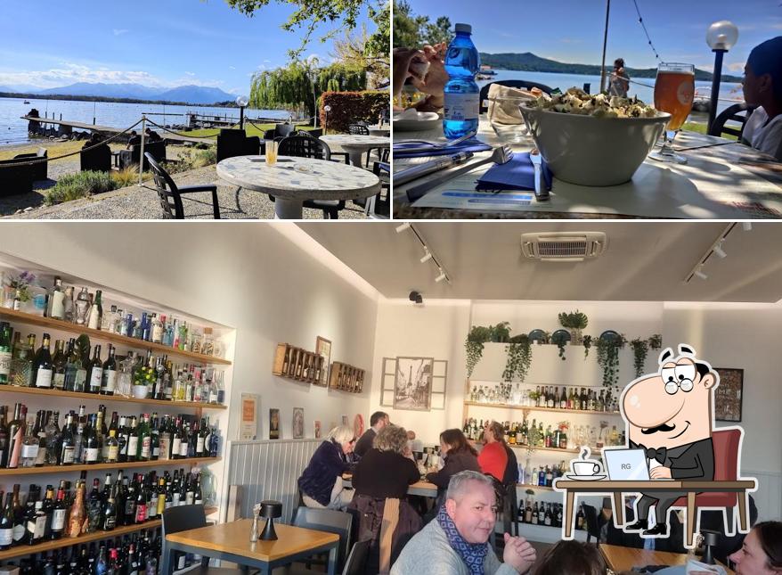 Questa è la foto che mostra la interni e cibo di Il Porticciolo Malè Bar e Lounge