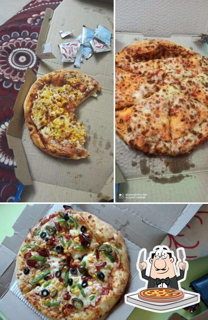 Pick pizza at Domino's Pizza