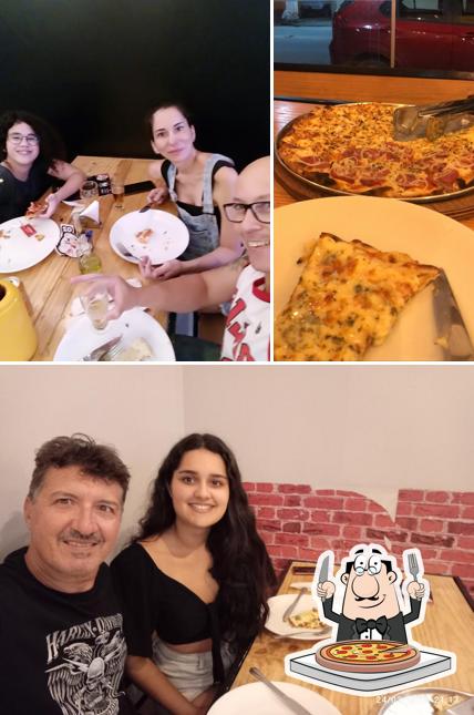 Consiga pizza no Nino´s Pizzaria