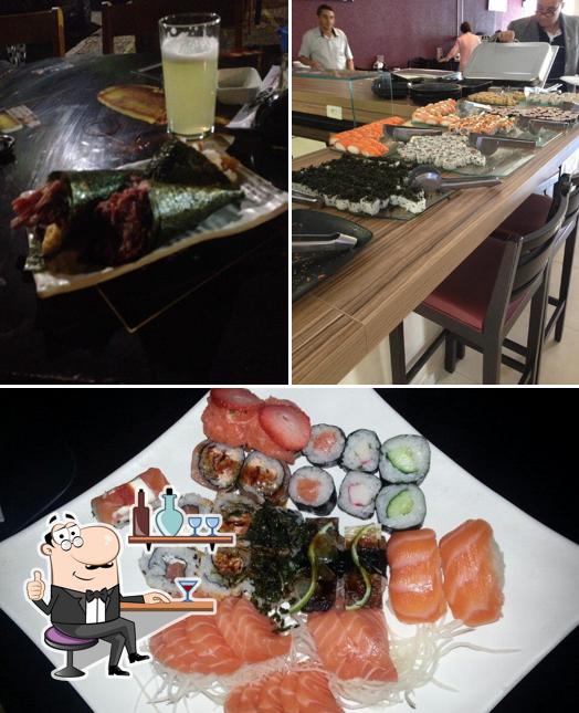 A ilustração do Yamato Sushi & Sake House’s interior e comida