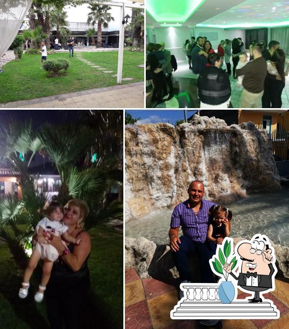 Guarda gli esterni di Ristorante-Pizzeria "Palm Garden"