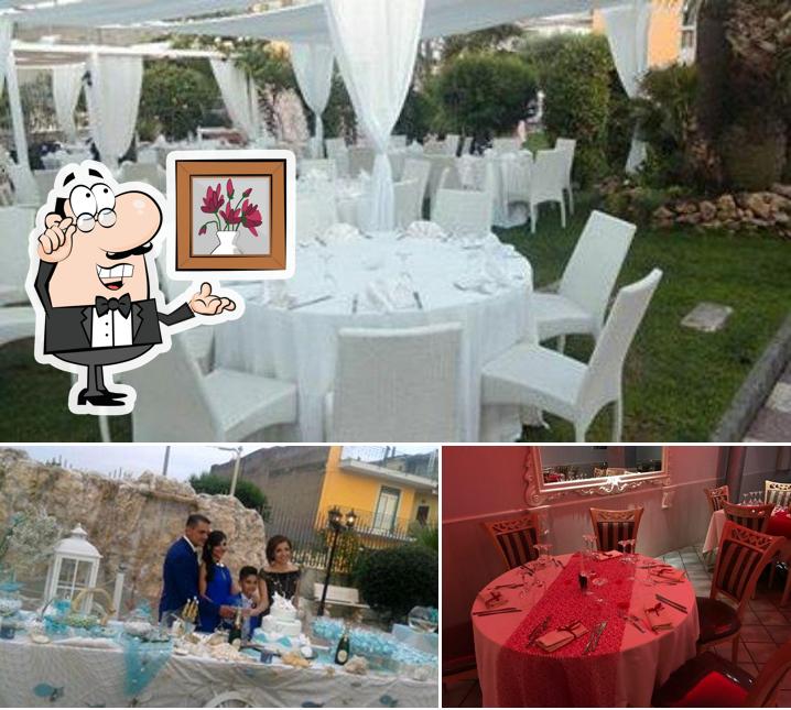Dai un'occhiata agli interni di Ristorante-Pizzeria "Palm Garden"