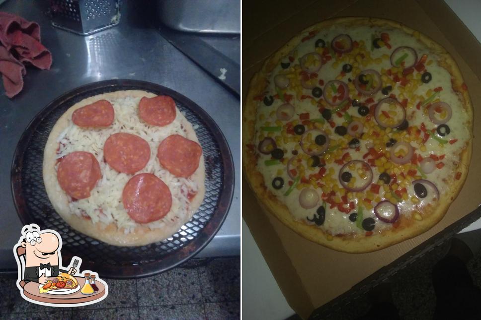 Отведайте пиццу в "D' Fina Comida Rápida"