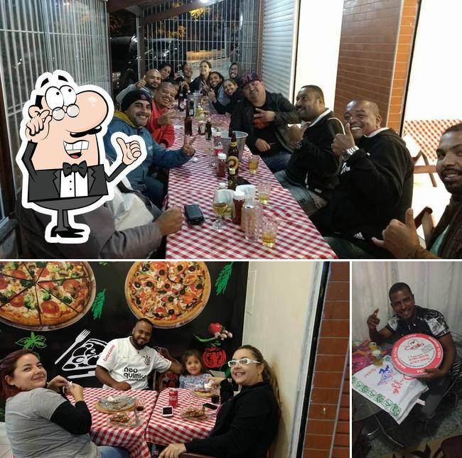 O interior do Gallo Pizzaria