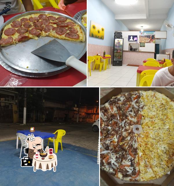 A imagem do Pizzaria Chega Mais’s comida e interior