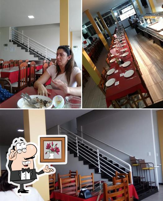 O interior do Restaurante Gosto & Sabor