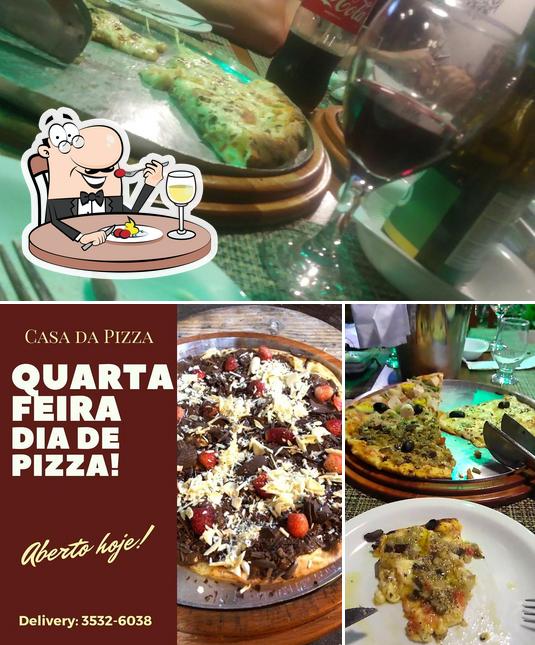 Esta é a foto mostrando comida e bebida a Casa Da Pizza