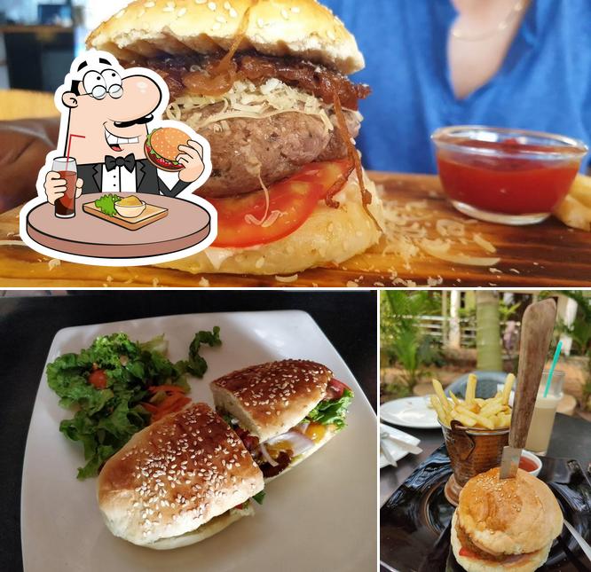 Order a burger at Cafe Inn