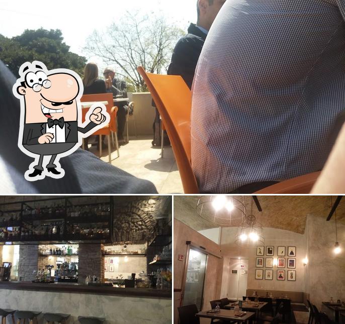 La foto della interni e bancone da bar di NEXT Food & Lounge