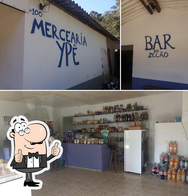 Look at the photo of Bar do Zelão