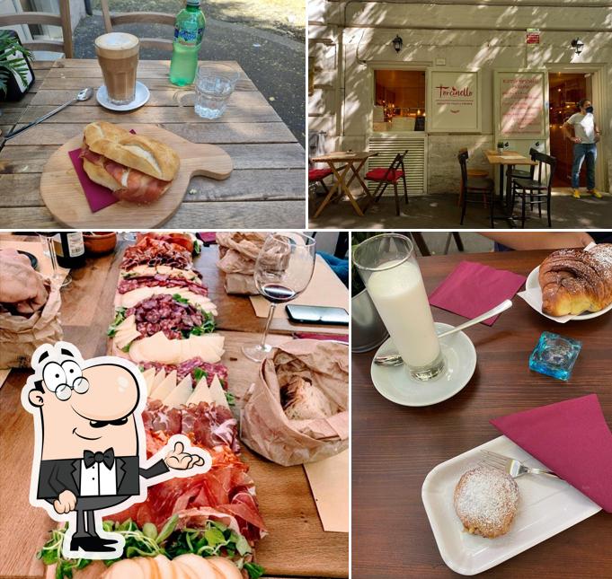 Dai un’occhiata alla foto che mostra la interni e tavolo da pranzo di Torcinello - Country Food & Drinks