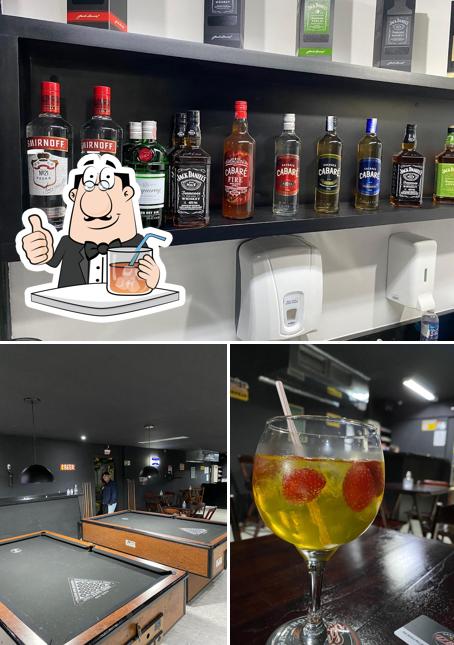 A imagem a Dbreja Pub Hamburgueria, Petiscaria e Chopperia’s bebida e interior