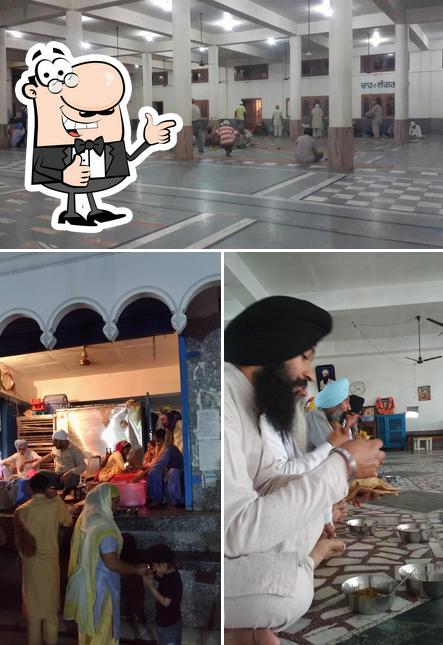 Look at the photo of Guru Ka Langar ਗੁਰੂ ਕਾ ਲੰਗਰ