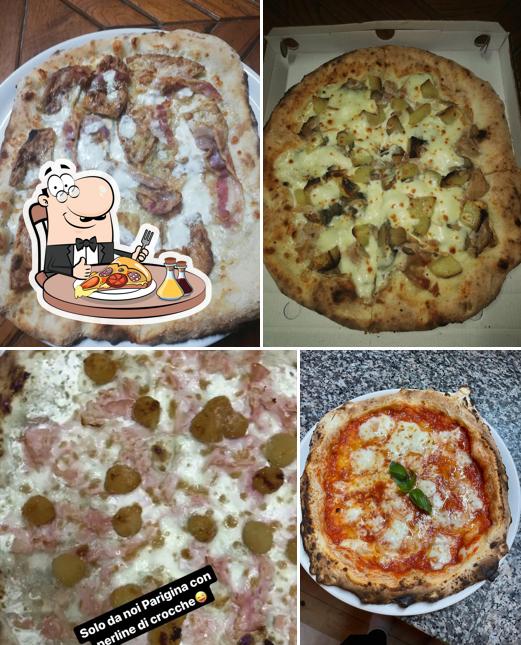 A Pizzeria Adde' Guagliuni Di La Pietra Carmine, puoi provare una bella pizza