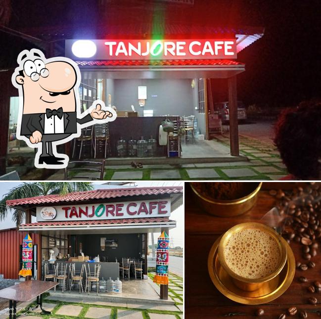 This is the picture displaying interior and beverage at Tanjore Cafe