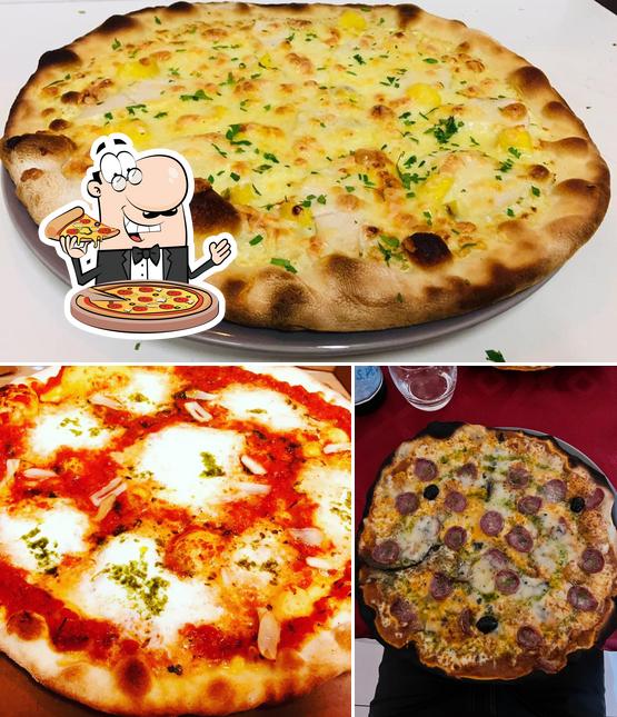 A Pizzeria La Toscane, vous pouvez prendre des pizzas