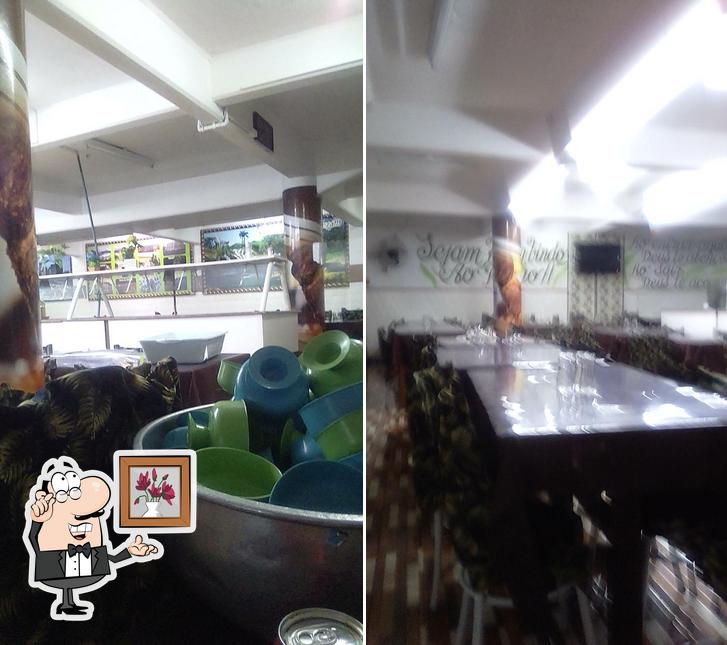 O interior do Restaurante e Churrascaria O Porão