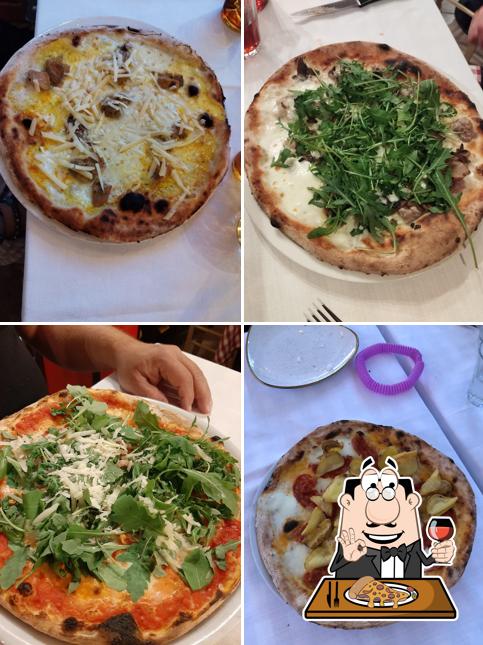 A Trattoria Pizzeria Lupo Alberto, vous pouvez déguster des pizzas